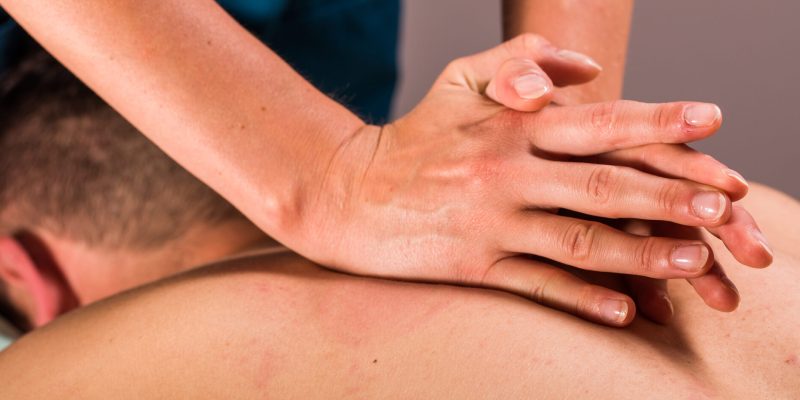 A person receives a deep tissue massage.